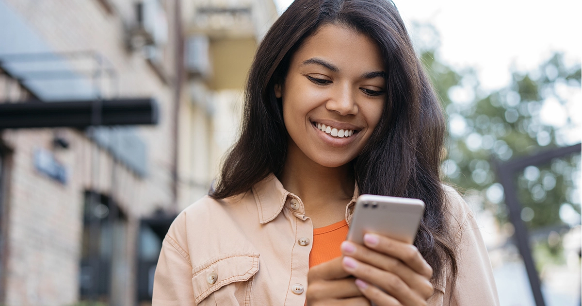 Teen female ADHD patient using a smartphone to search for a Relexxii in stock pharmacy with Medfinder